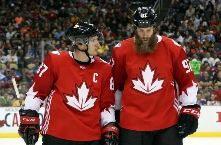 Hockey player on ice, dynamic side view